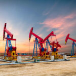 Oil rises as draw in US crude stocks signals firm demand